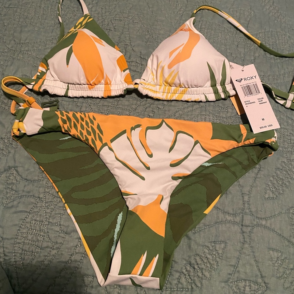 NEED TO SELL ASAP!!! Roxy swim set with original tags.
